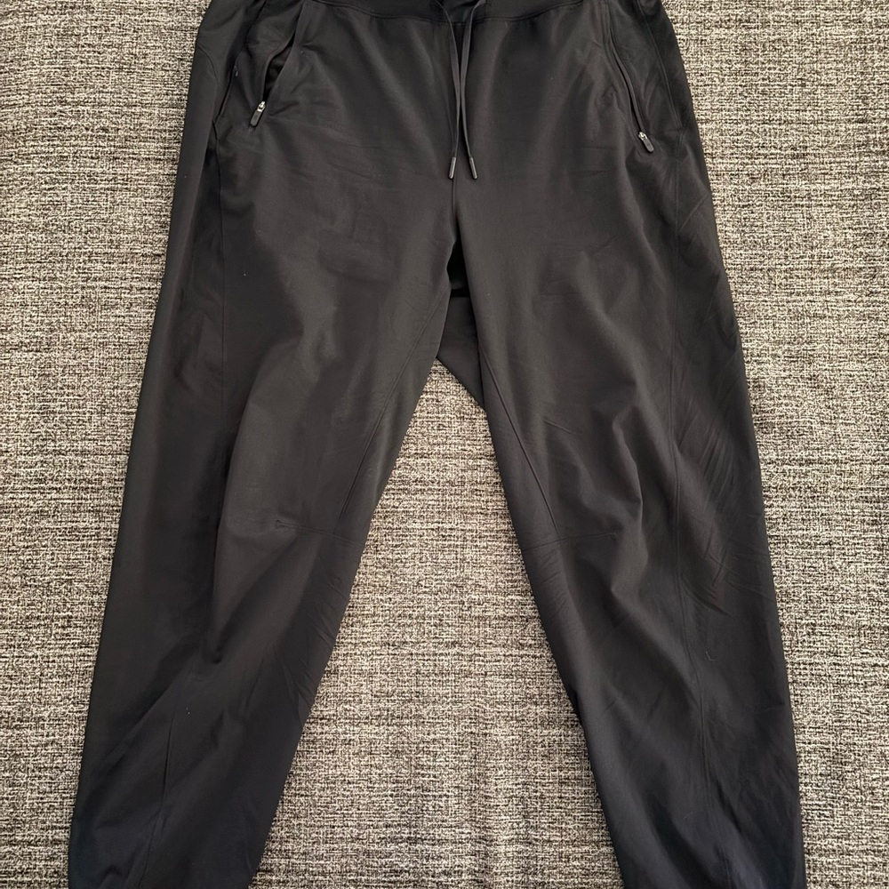 Lululemon Athletica Black Track Pants with Tapered Fit. Size 12